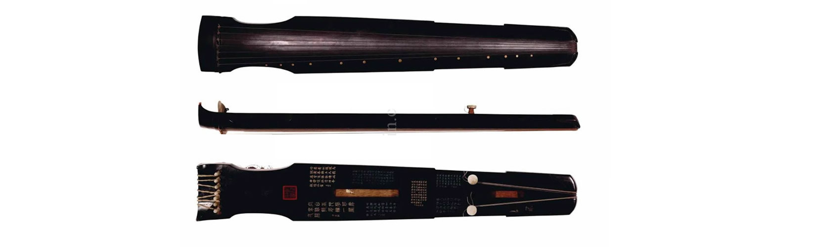 Master craftsman handcrafting a custom Guqin